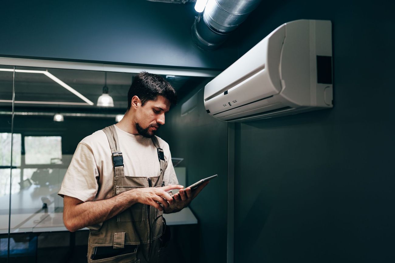 AZ Air Control technician running system diagnostics